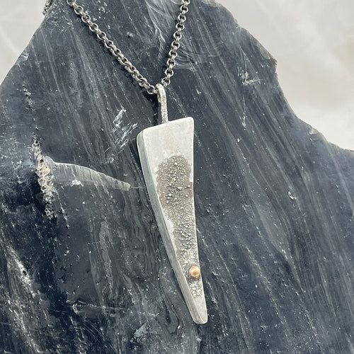 Hollow form triangle pendant necklace from Junk to Jems, jewelry designer in Bend Oregon